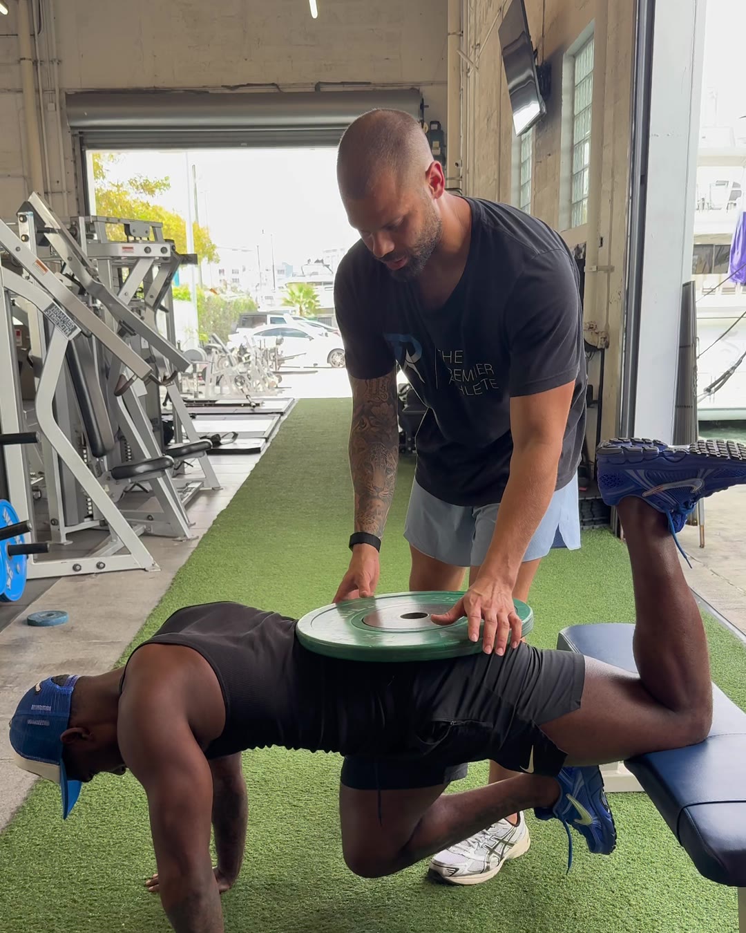 Dr. Evan Motlong coaching hip strength work